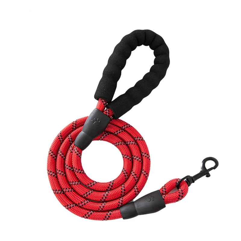 Furmont red dog leash with padded handle and black clasp, coiled on white background