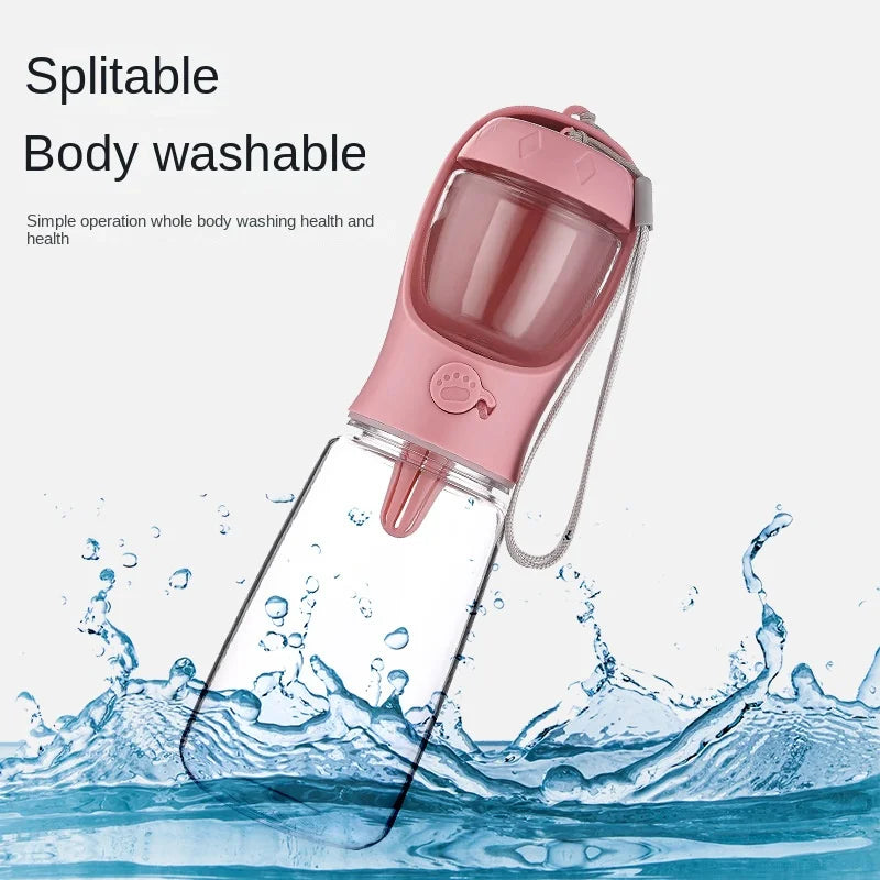 Pink portable pet water bottle, splitable and body washable, shown with water splashes on Furmont homepage.